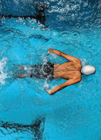 Outdoor swimming pool with lounge chairs